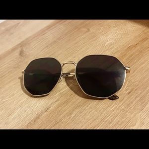 A pair of Steve Madden sunglasses. Basically brand new they were only worn once.